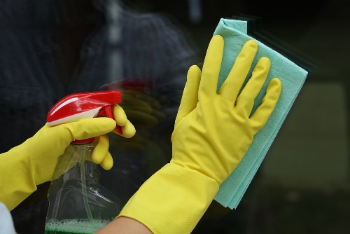 Carpet cleaning team preparing a safe workspace