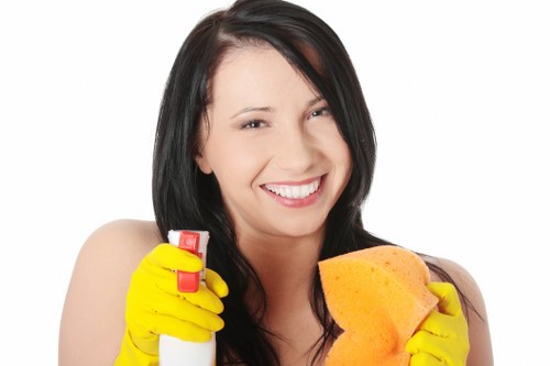 Cleaner using protective equipment while applying carpet cleaning methods