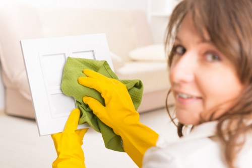 Professional deep cleaning of a living room sofa in NW1