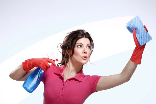 Carpet cleaning specialist treating a high-traffic area in NW1